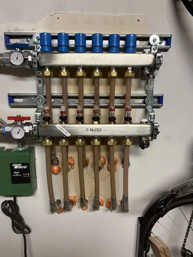 Plumber performing Gas Line Installation at a residential property in East Ridge